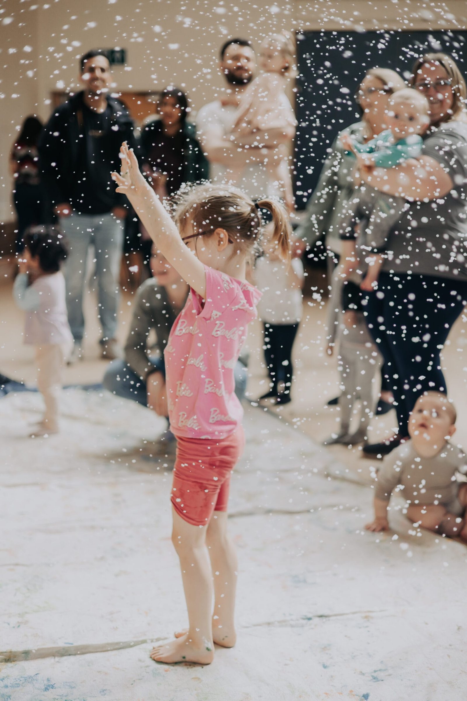 A child enjoying a Messy Monkey Makers sensory play session